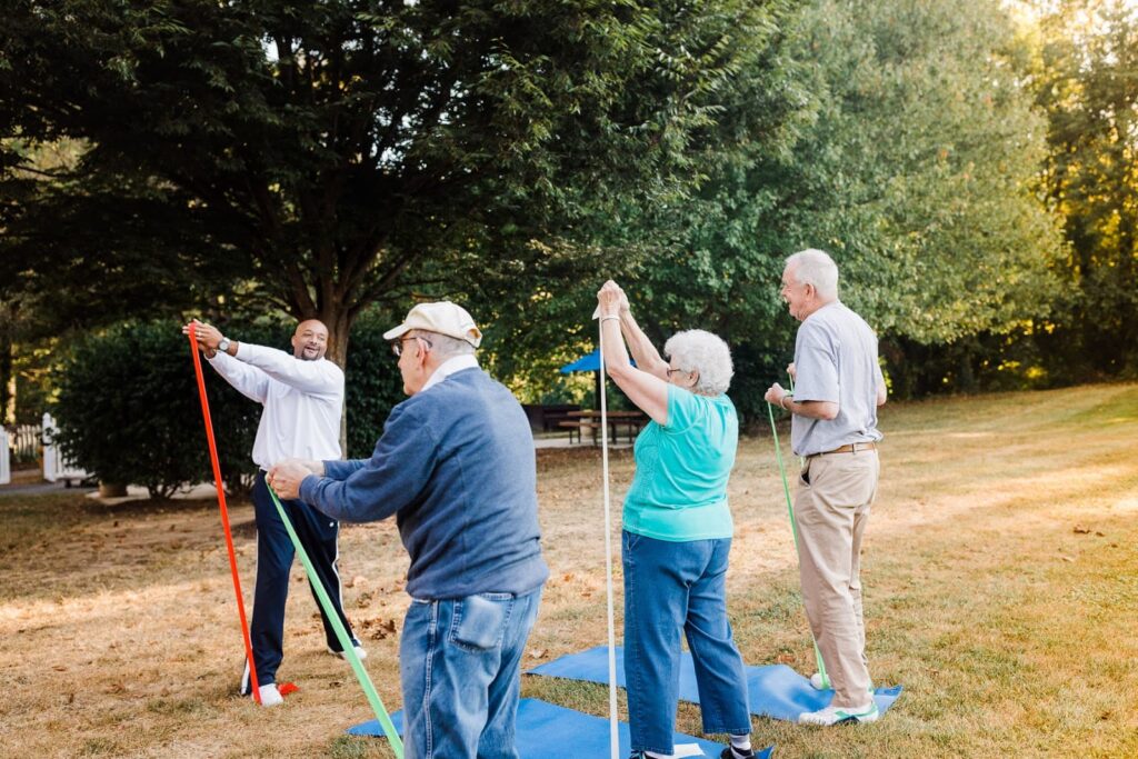 residents doing exercises with resistance bands