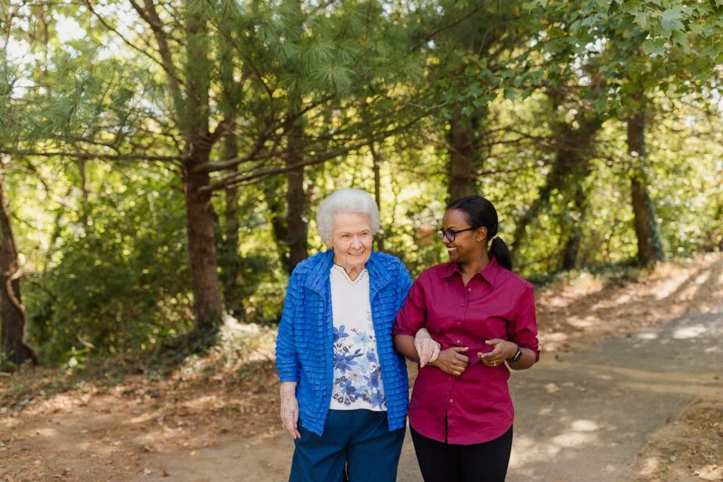 resident walking with family member outside