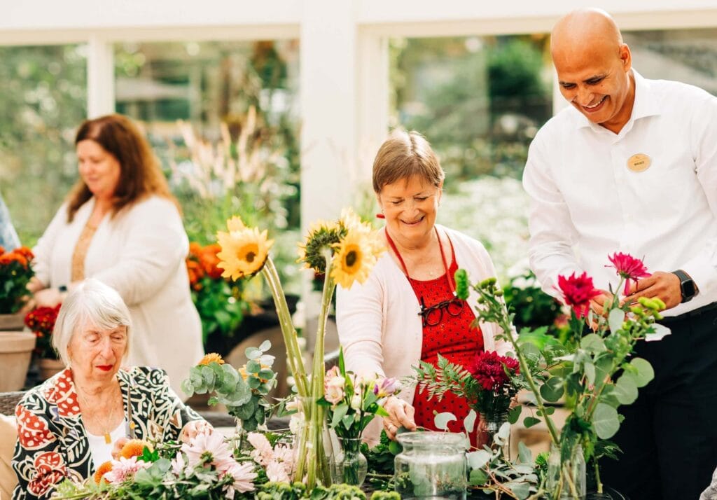 residents gardening in senior living