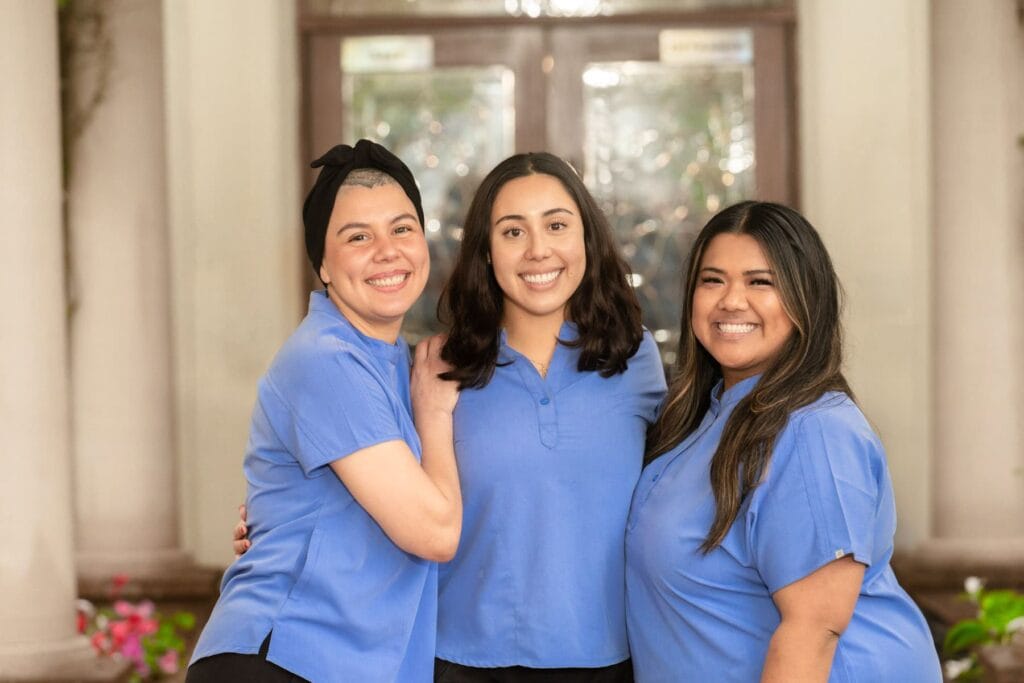 group photo of three care team members