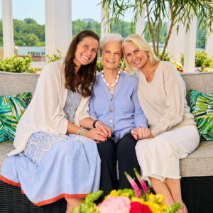 elderly mother and adult daughters