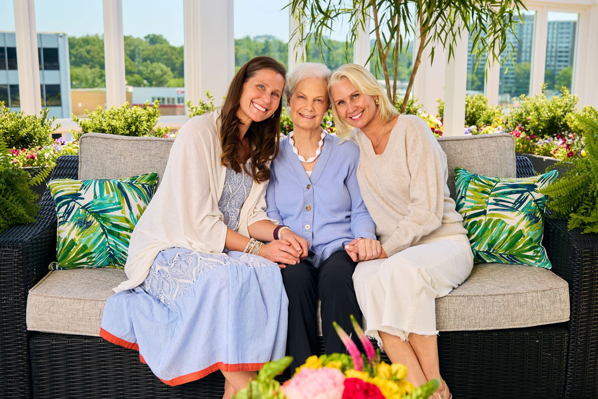 elderly mother and adult daughters
