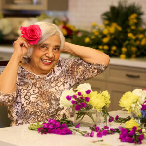 Senior lady doing flower arrangements