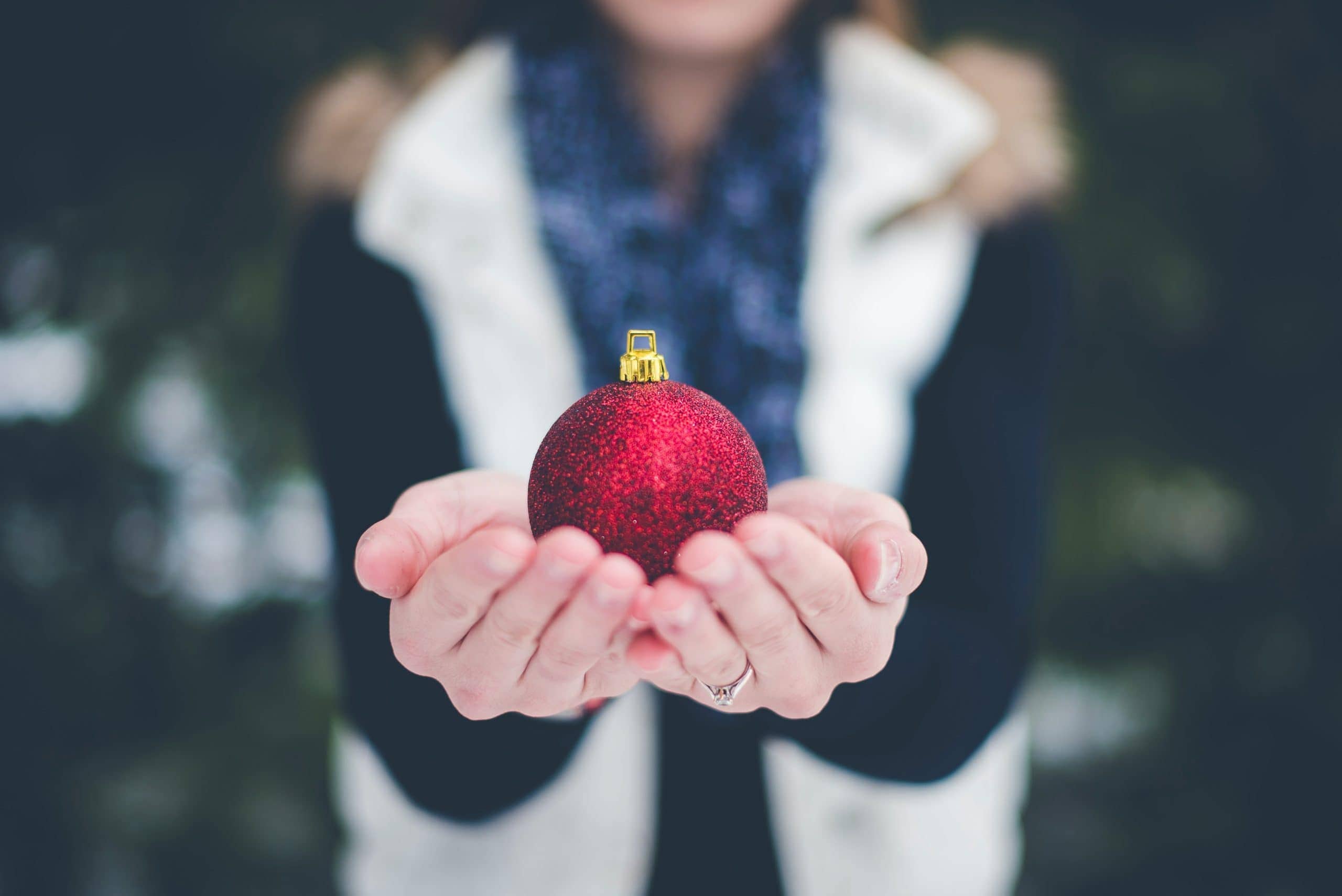 woman holding an ornament