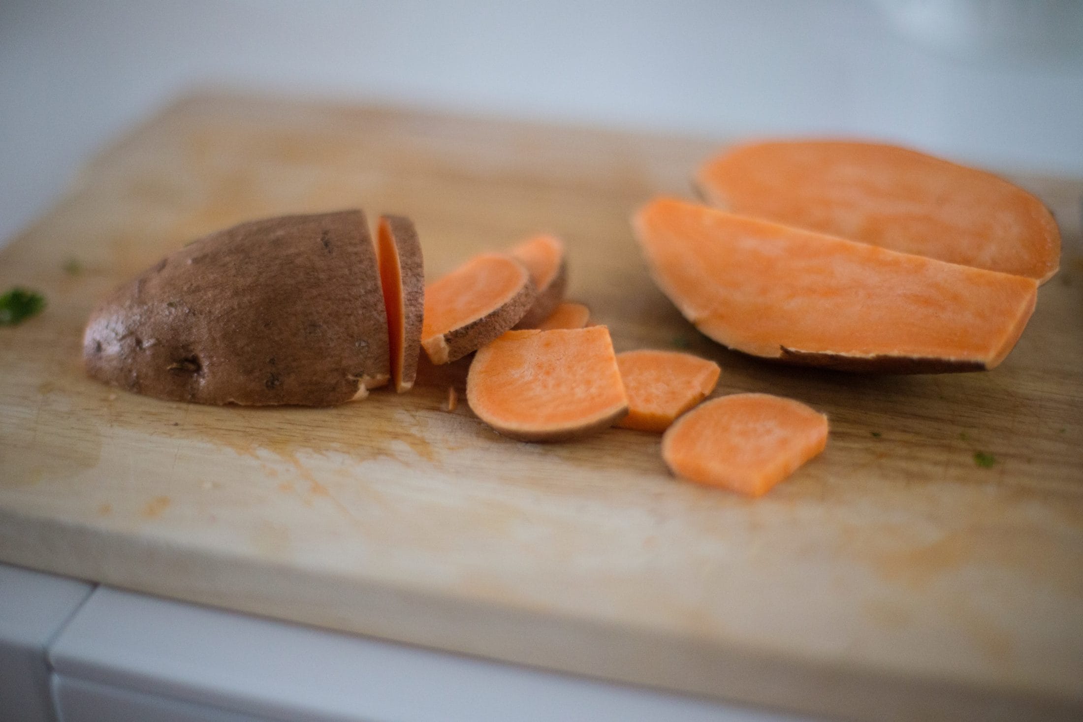 sweet potato on cutting board