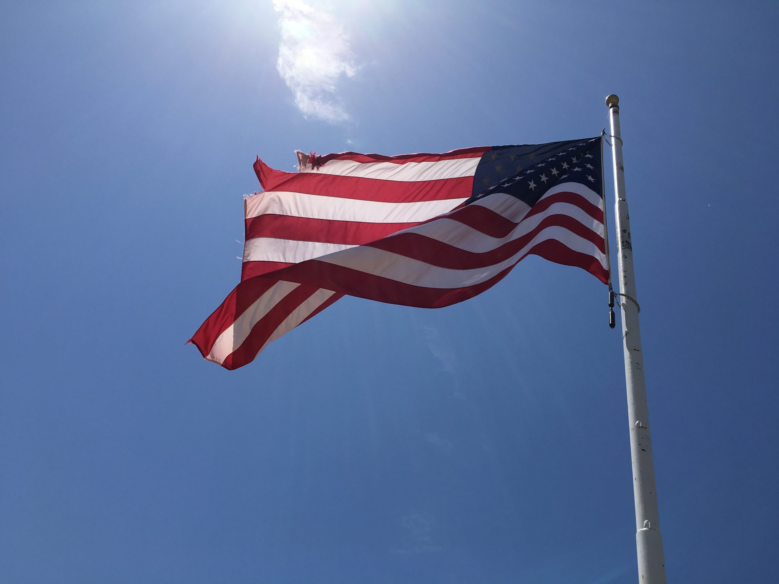 American Flag against blue sky