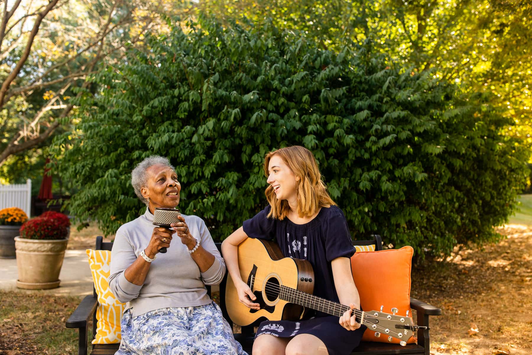 resident with woman playing music