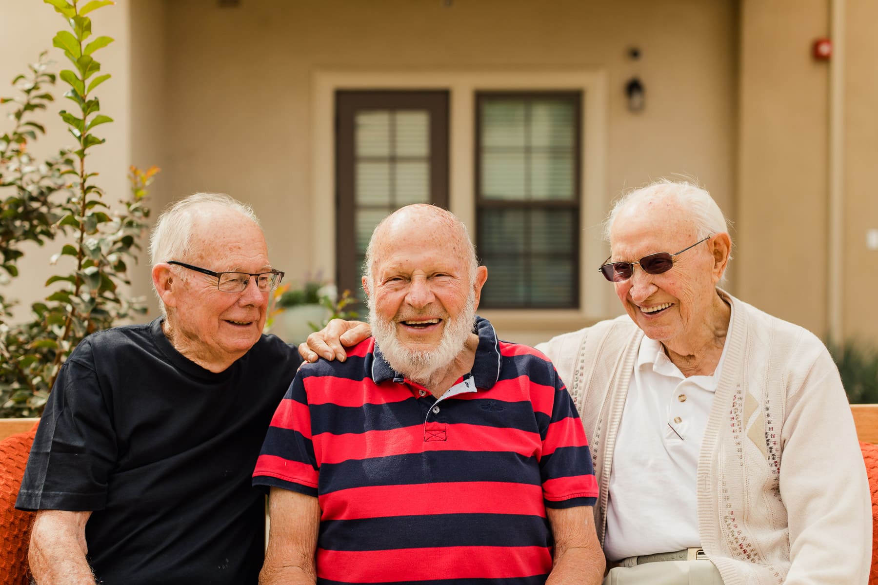 three residents laughing