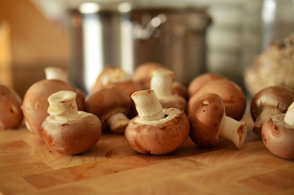 mushrooms on chopping block