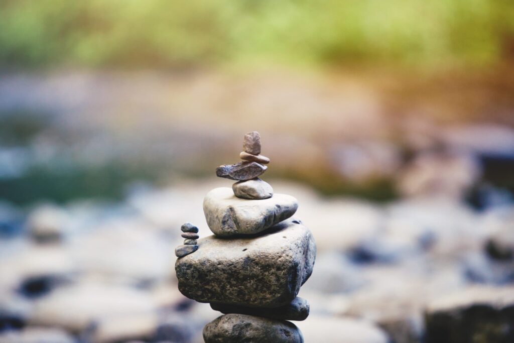 stones balancing near a creek