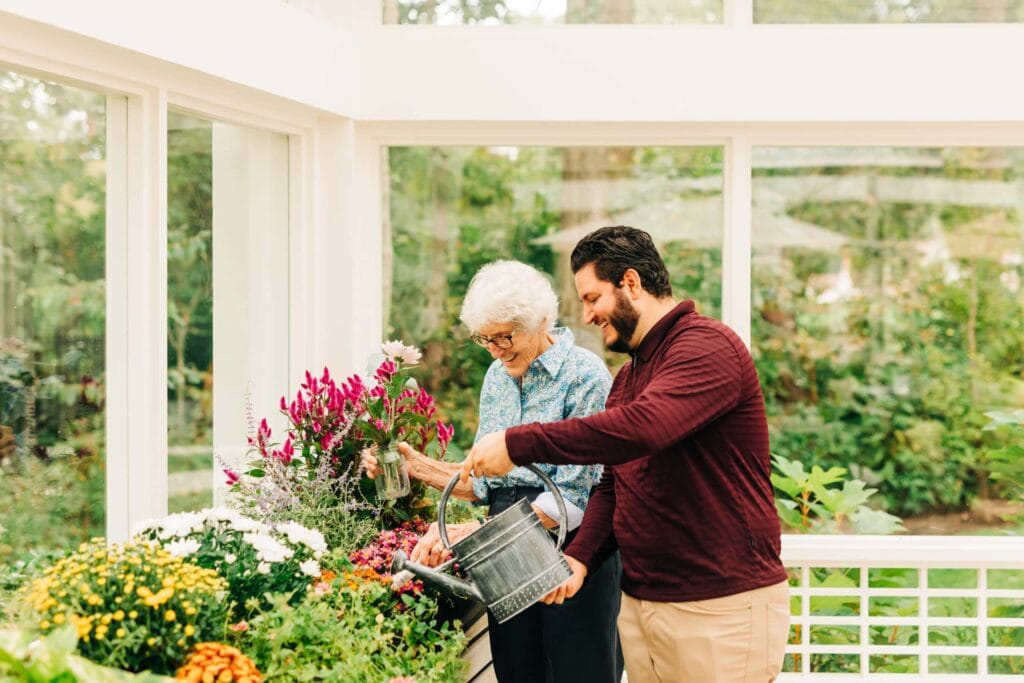 resident with relative gardening