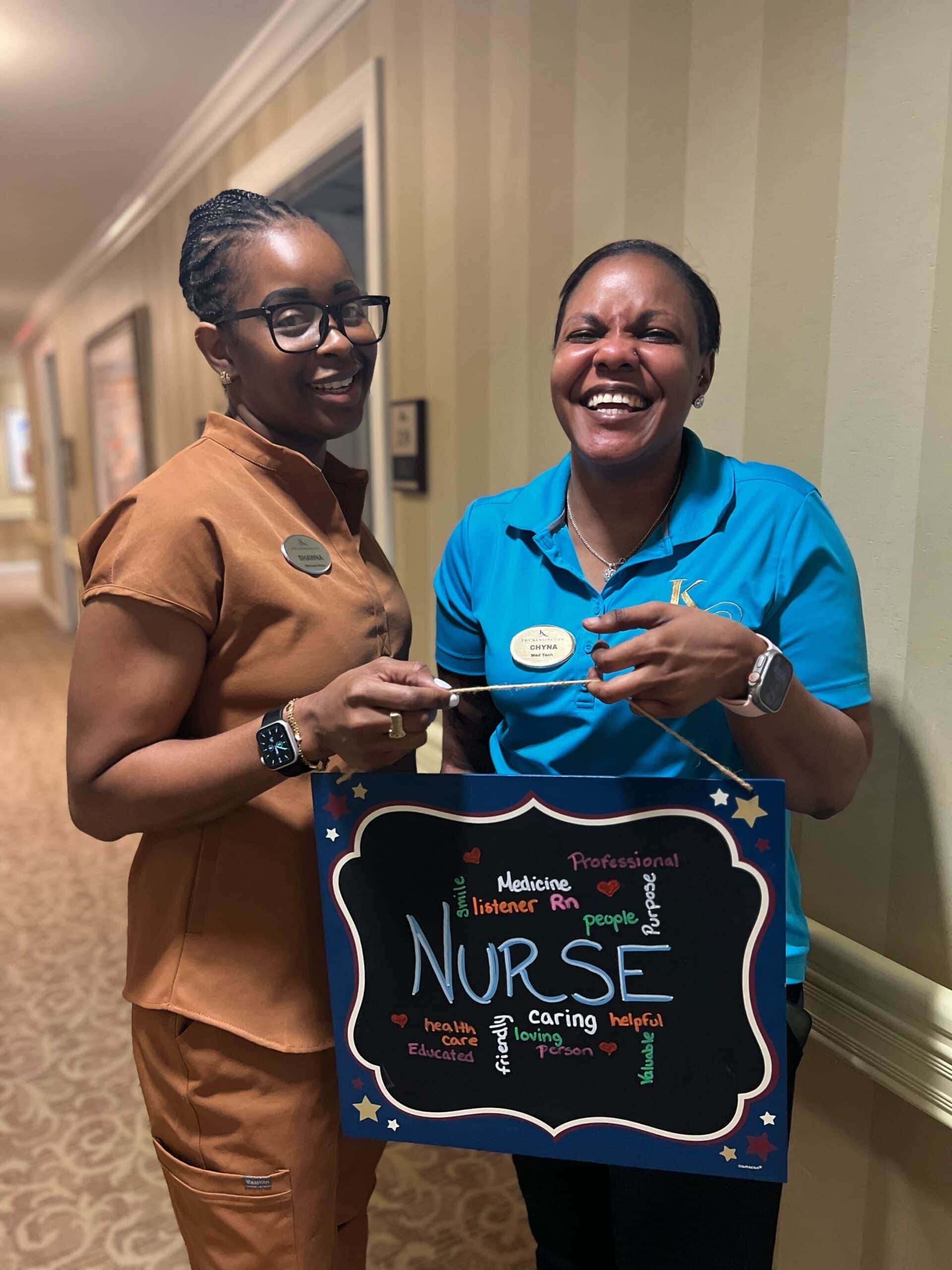 nursing team members holding sign for Nurse's Week