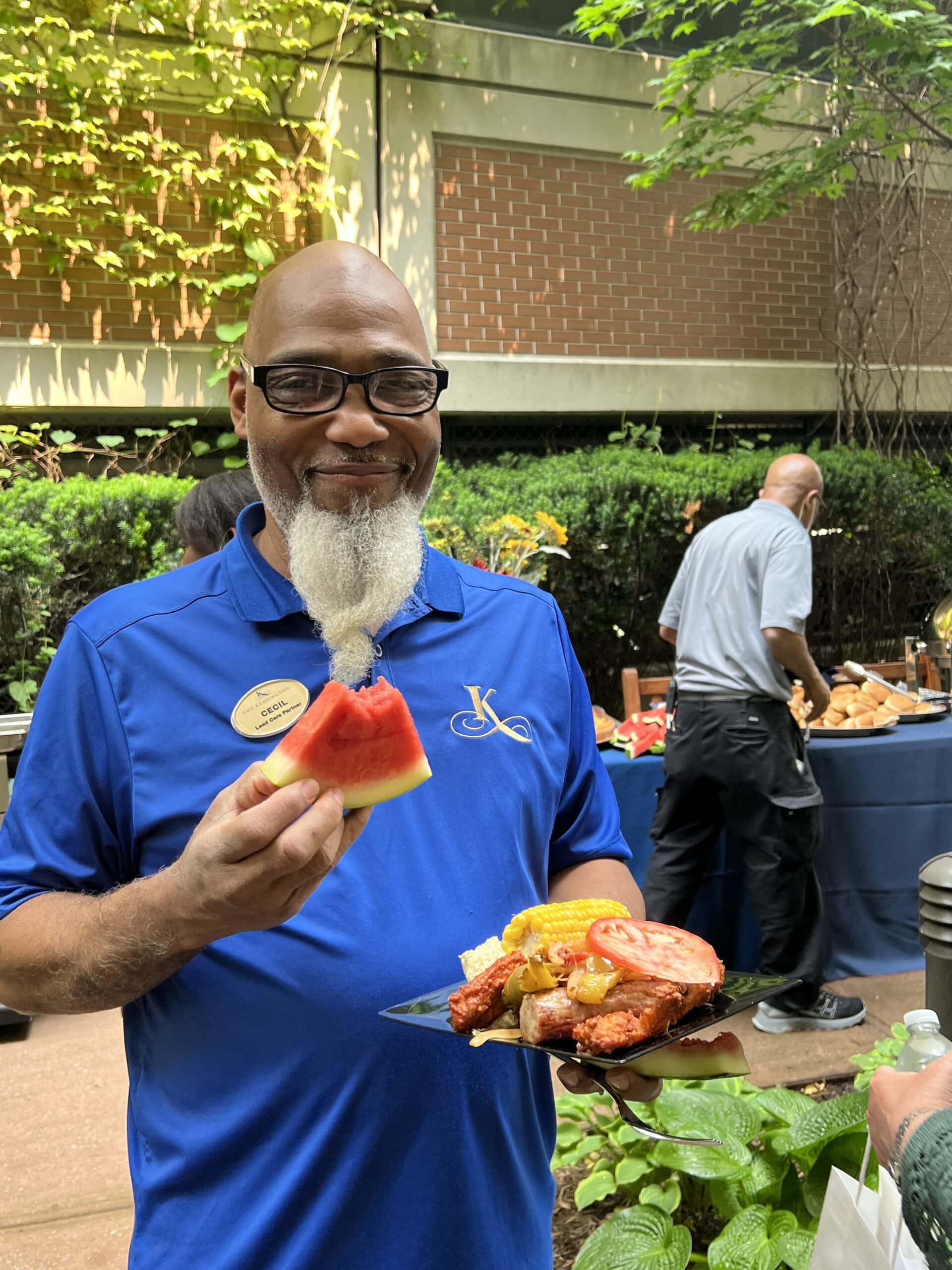 team member at community barbecue