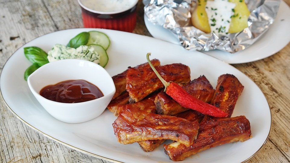 barbecue sauce on plate with spare ribs